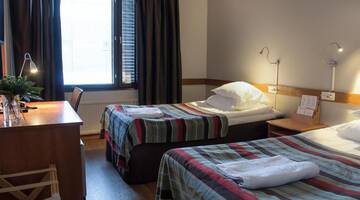 Фото номера Двухместный номер с 2 отдельными кроватями Отель Original Sokos Hotel Valjus Kajaani г. Каяани 20