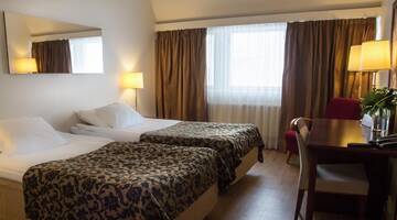 Фото номера Двухместный номер с 2 отдельными кроватями Отель Original Sokos Hotel Valjus Kajaani г. Каяани 6