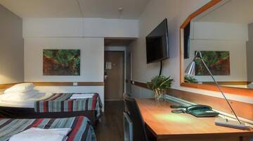 Фото номера Двухместный номер с 2 отдельными кроватями Отель Original Sokos Hotel Valjus Kajaani г. Каяани 12