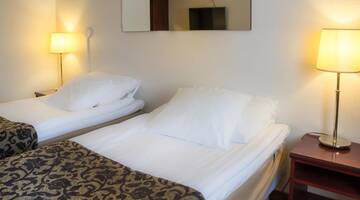 Фото номера Двухместный номер с 2 отдельными кроватями Отель Original Sokos Hotel Valjus Kajaani г. Каяани 10